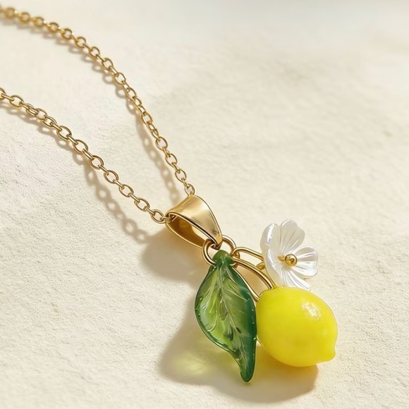 Jewelry - Gold-Tone Lemon Pendant Necklace with Green Leaf and White Flower